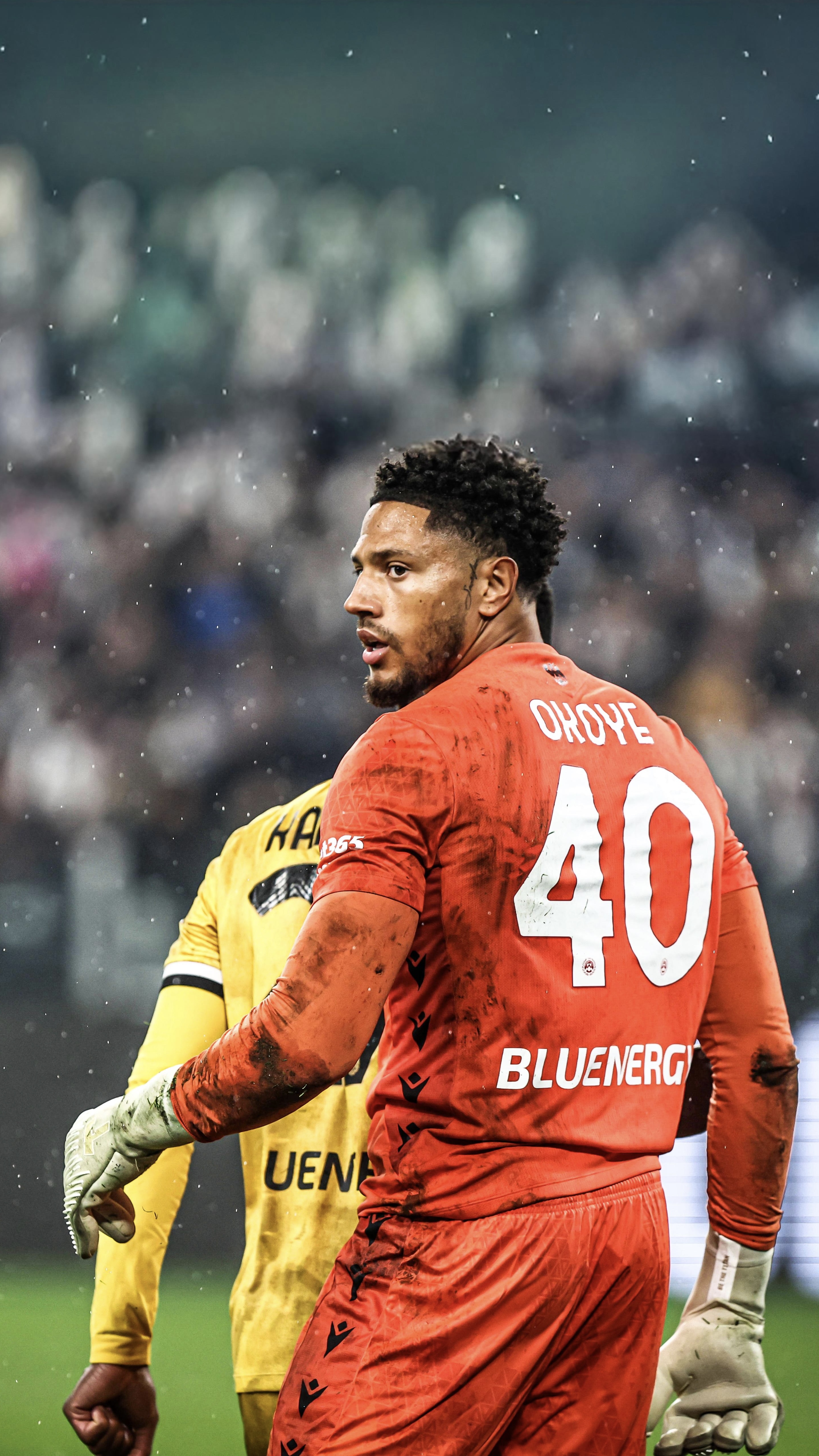 Maduka Okoye in his orange Udinese goalkeeper kit, number 40