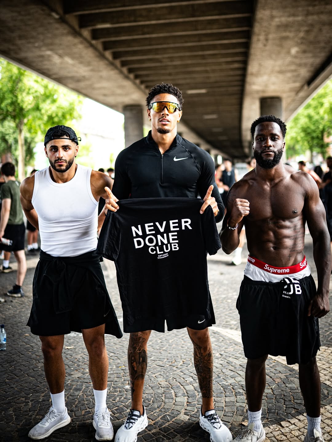 Okoye with friends, Never Done Club